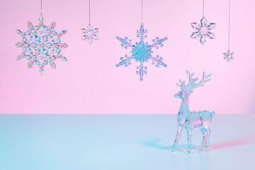 Abstract surreal Winter scene with Christmas decorations made of crystal glass. Xmas deer and...