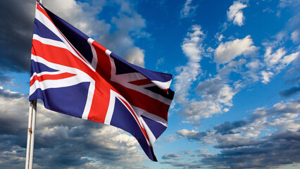 UK, United Kingdom, Union Jack flag waving in sky