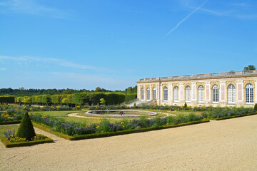 Obraz premium Title: The Marlborough Tower and pond in the Queen s Hamlet at Marie-Antoinette s Estate near Versailles Palace.