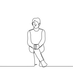 man sitting with one leg crossed and arms crossed on his knees - one line drawing vector. concept waiting, informal sitting posture