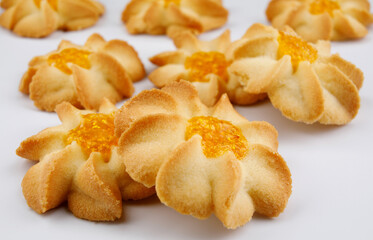 Shortbread cookies on a light background . Kurabye cookies with jam . Cookies in the shape of a flower .
