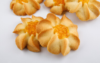 Shortbread cookies on a light background . Kurabye cookies with jam . Cookies in the shape of a flower .