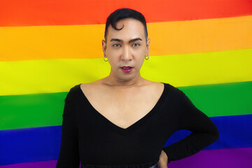 Transgender male isolated rainbow pride flag background celebrate pride month, LGBTQ photo concept