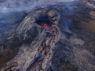 Volcanic landscape in Iceland. Volcano crater from above before eruption. View of the red lava...