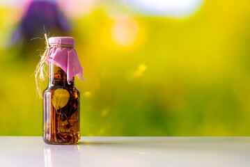 a bottle of pickled canned herbs