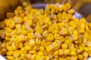 fresh corn in a saucepan