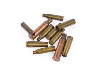 Spent shells from assault rifles different caliber on white background