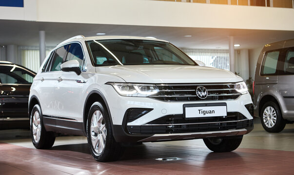Vinnitsa, Ukraine - February 18, 2021.  Volkswagen Tiguan 2021 - new model car presentation in showroom - side view