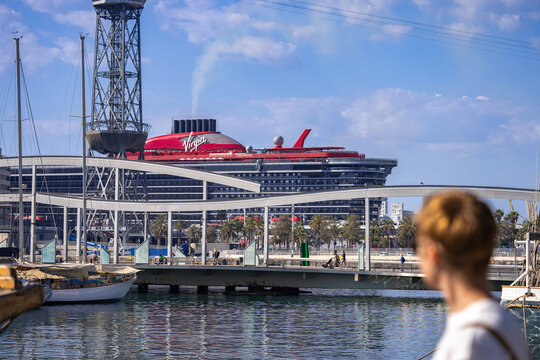 Close up view of Valiant Lady liner. A new cruise ship operated by Virgin Voyages in the port of Barcelona during beautiful sunny day. Barcelona, Spain - May 29, 2022