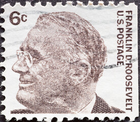 UNITED STATES - CIRCA 1966: a postage stamp from UNITED STATES , showing a portrait of the 32nd President of the United States , Franklin Delano Roosevelt (1882-1945) . Circa 1966
