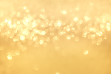 gold bokeh background for christmas, greeting card and for various festivals