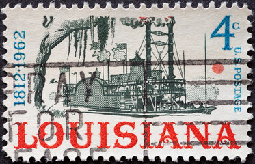 UNITED STATES - CIRCA 1962: a postage stamp from UNITED STATES , showing a historic paddle steamer...