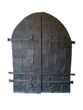 Old medieval iron door. Isolated on white.