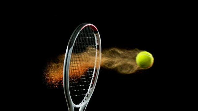 Super slow motion of hitting tenis ball with powder explosion. Filmed on high speed cinema camera, 1000fps.
