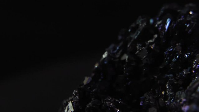 A Purple Mineral (Amethyst) in Dark Room, Closeup Slider Slider 