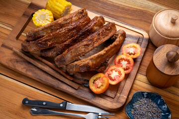 Pork Spare Ribs with Barbecue seasoned spicy basting sauce, Grilled sliced barbecue pork ribs on...