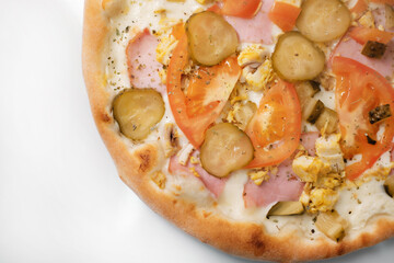 Italian pizza with tomato, cucumber and cheese. The process of making pizza. Street food cooking concept.