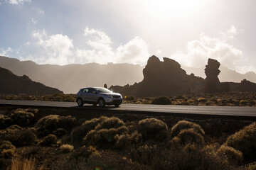 Car on the road in Teide National Park on Tenerife island, Spain.