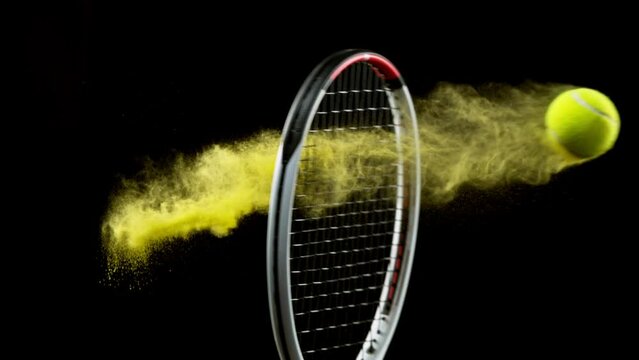 Super slow motion of hitting tenis ball with powder explosion. Filmed on high speed cinema camera, 1000fps.