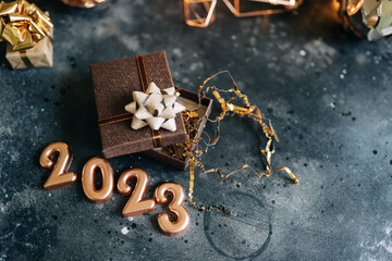 Happy New Year 2022. Golden Background with Confetti