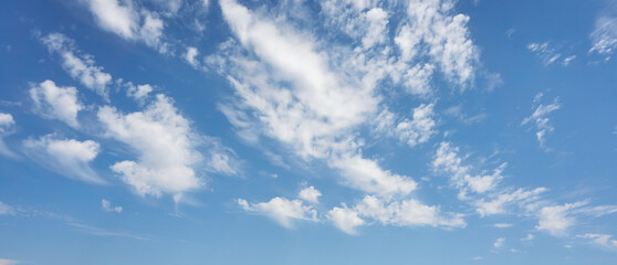 Blue sky with white clouds background