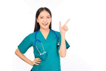 Portrait of professional confident young asian female smiling doctor in green scrubs showing presenting finger to empty space, doctor healthcare and doctors concept.