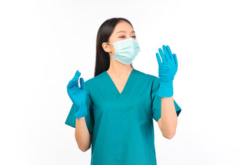 portrait asian female doctor in scrubs standing fingers protection flu cold facial with mask wearing surgical gloves