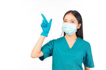 portrait asian female doctor in scrubs standing pointing fingers protection flu cold facial mask white background copy space for your advertisement, Self-isolation, social distancing.
