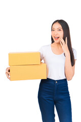 Happy cute asian woman smiling and holding package online marketing and delivery Start a small business at home on white background, Delivery shipping service concept.