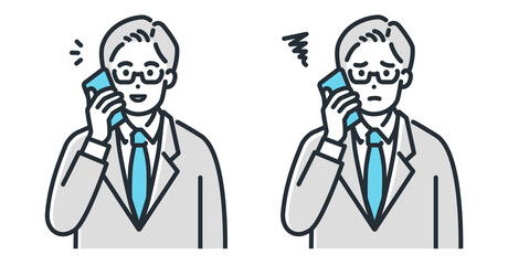 携帯電話をかける作業着を着た男性。