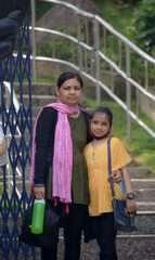AN INDIAN MOTHER AND HER DAUGHTER IS ENJOYING IN ZOO HYDERABAD ELANGANA INDIA