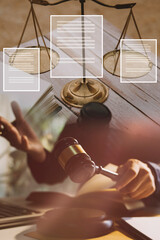 Business and lawyers discussing contract papers with brass scale on desk in office. Law, legal services, advice, justice and law concept picture with film grain effect