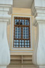 metal lattice on the window in the mosque decorated with beautiful patterns
