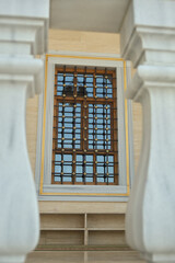 metal lattice on the window in the mosque decorated with beautiful patterns