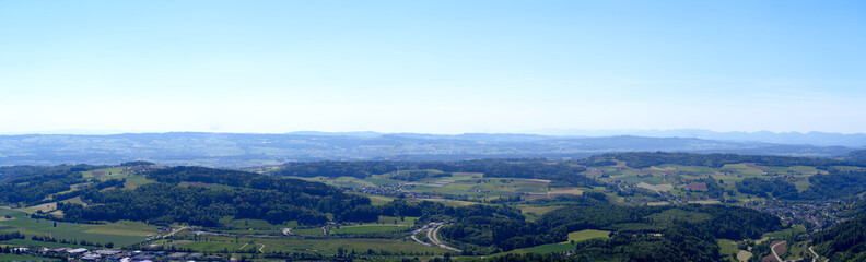 Wide angle aerial view of City of Zürich and Lake Zürich seen from local mountain Uetliberg on a sunny spring day. Photo taken May 18th, 2022, Zurich, Switzerland.