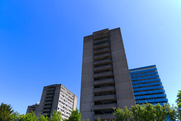 Concrete apartment towers of Triemli Hospital at City of Zürich on a sunny spring day. Photo taken May 18th, 2022, Zurich, Switzerland.