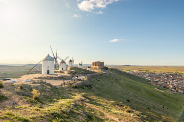 Fototapeta na wymiar Windmills of Consuegra in the province of Toledo during a sunset with a clear summer day