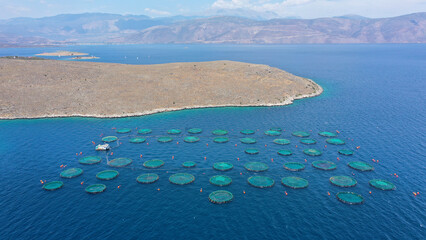 Aerial drone photo of sea bass and sea bream fishery or fish farming unit in Mediterranean calm...