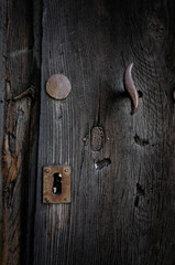 Old rustic door, photograph taken in the streets of Valverde de los Arroyos, Guadalajara, Spain.