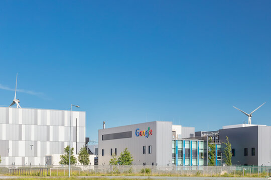 Entrance view of a Google data center in front of a clear blue sky in Eemshaven, The Netherlands on June 2, 2022