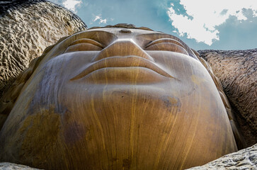 Sculptures carved in sandstone on the Ruta de las Caras, is a hiking route on the banks of the Buendia reservoir, Cuenca, Spain.