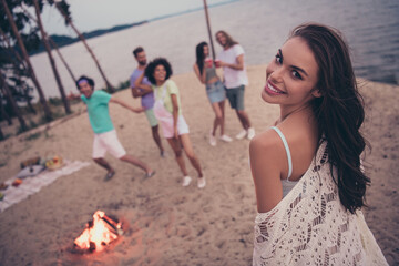 Photo of cheerful nice campfire evening gathering people dance wear casual outfit nature seaside beach outdoors