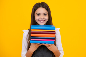 Schoolgirl with copy book posing on isolated background. Literature lesson, grammar school. Intellectual child reader.