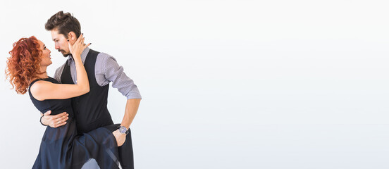 Banner social dance, bachata, kizomba, zouk, tango concept - Man hugs woman while dancing over...