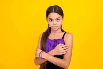 Children studio portrait on yellow background. Childhood lifestyle concept. Cute teenage girl face close up.