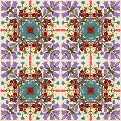 Seamless pattern with tribal ethnic  flowers. Geometrical symmetry shape. Red, purple and yellow colors motif. Great for Fabric Print.