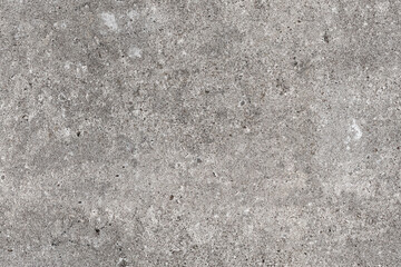Grungy gray concrete wall. Seamless background