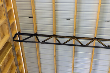 A large steel roof frame for t building a storage warehouse for installing a roof