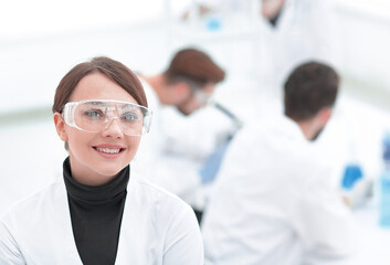 portrait of scientist in laboratory background.