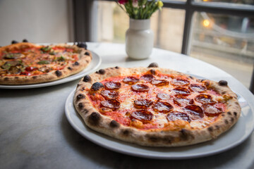 Margherita cheese and pepperoni pizza